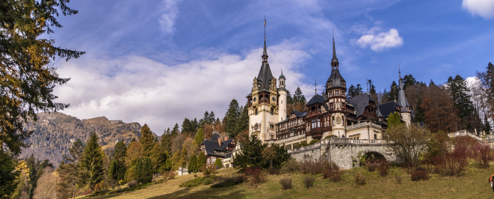 A Romanian castle on top of a small hill