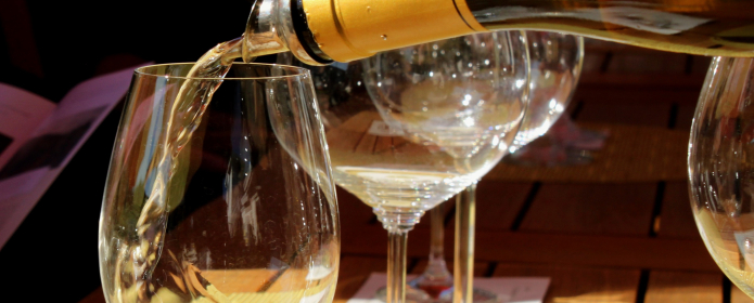 Appropriately licensed image from https://commons.wikimedia.org/wiki/File:Pouring_chardonnay_wine.jpg